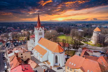 Drone aerial view of medieval old city. One of the beautiful town in Europe. Landscape to the city center and its historical buildings and old castle ruins.