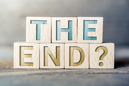 The End Written On Wooden Blocks On A Board