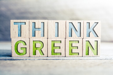 Think Green Written On Wooden Blocks On A Board