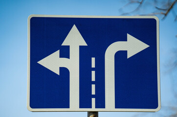 road sign the road goes left and right