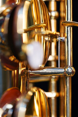 Saxophone jazz instruments. Alto sax isolated. Saxophone music instrument closeup on black                               