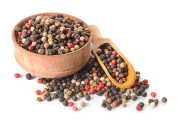 Bowl and scoop with peppercorns on white background
