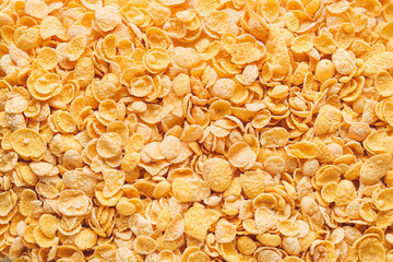 Texture of tasty cornflakes as background