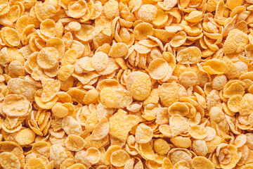 Texture of tasty cornflakes as background