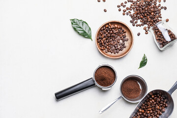 Composition with coffee beans and powder on light background