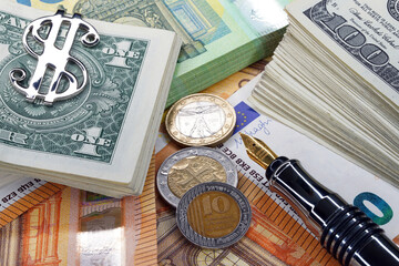 Dollar closeup. Money macro. A stack of cash in a silver clip. European currency. Money background                               