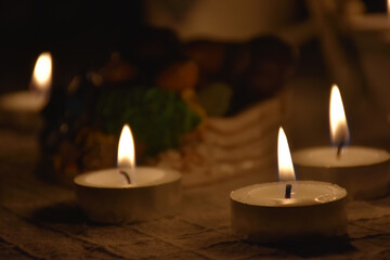 romantic tealights in a dim floor