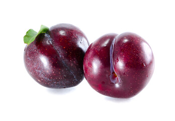 Two plums on a white background.Two plums on a white background.