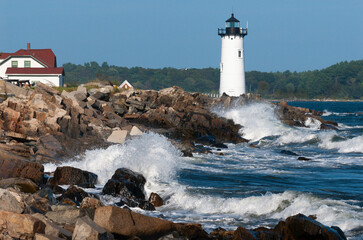 Waves Crash on Rocks by Portsmouth Harbor Lighthouse, by Fort Constitution in New Hampshire