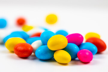 Selective focus of candies on white background. colorful candies in focus. Candy background photo. 