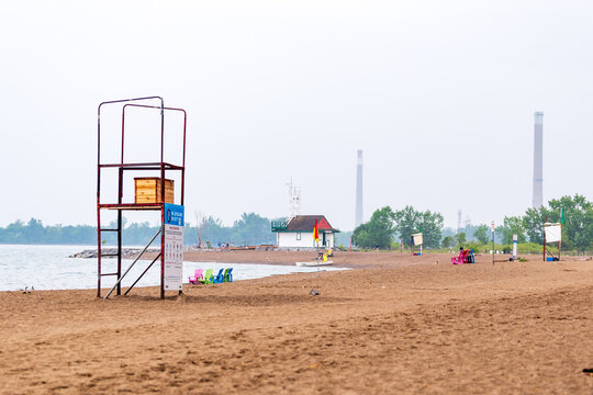 Looking west from Kew Beach a "Blue Flag Beach" in Toronto's Beaches neighbourhood toward the Leuty Lifeguard Station, and downtown on a summer afternoon.