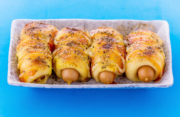 Mini pizza with sausage and cheese