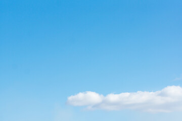 blue sky with light white clouds