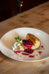 Homemade Cheesecake with Fresh Berries and Mint for Dessert - Healthy Organic Summer Dessert Cheesecake. Cheesecake.