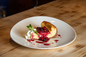 Homemade Cheesecake with Fresh Berries and Mint for Dessert - Healthy Organic Summer Dessert Cheesecake. Cheesecake.
