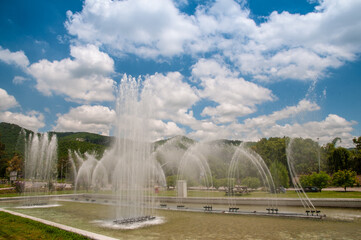 9th avenue highway road, Islamabad, fountains running, margalla hills in front, margalla road