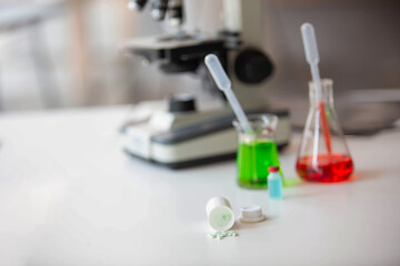 The doctor is testing a sample of biological tubes contaminated by Corona-virus Covid 19 and searching for a vaccine or Syrup against the virus. In the laboratory and film samples of infected lung