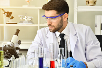 Chemistry industry lubricant oil test in laboratory concept. The professional science chemistry Make analysing sample petroleum gasoline fuel in chemical laboratory.