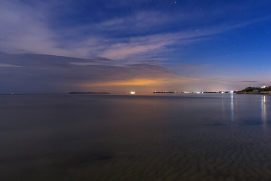 View of the sea on a moonlit night made with long exposure. Ochakov. Ukraine