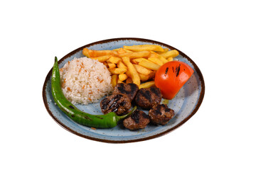 grilled turkish meatballs rice tomato and french fries. Turkish cuisine traditional Turkish food. fried meatballs. on a white background and shadow