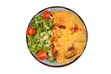omelet with fresh vegetables salad on a white plate on white background. top view