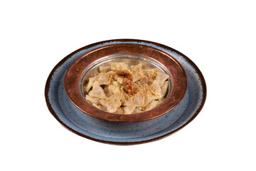Turkish ravioli - manti (Kastamonu halucka) yoghurt, 
red pepper and mint. Turkish traditional food in white background. old turkish copper plate