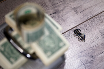 Dollar closeup. Money macro. A stack of cash in a silver clip.  Christmas concept.                          
