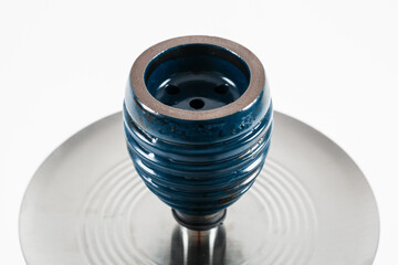 Blue hookah bowl in the shape of a beehive. White background.