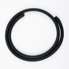 Rubber black hookah hose on a white background.