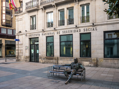 Vitoria-Gasteiz, Basque Country, Spain - April 4, 2019: Sculpture "The Reflection"/"The Bullfighter" in Dato Street in the city center, in the back an office building of the Spanish Social Security