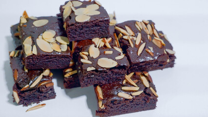  chocolate brownie with almond  on white