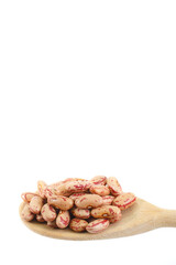Beans in a wooden spoon