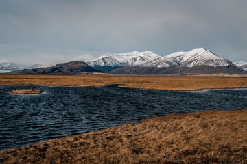 Stormy waves, snow, Massive water, Icelandic nature, moody scenery, traveling rough landscape
