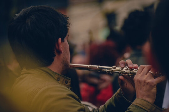 Person Playing The Flute