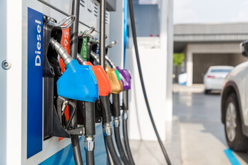 Fuel Pump, Gas Station, Gasoline. Colorful Petrol pump filling nozzles isolated on white background...
