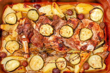 Fototapeta na wymiar Roasted lamb with potato and zucchini