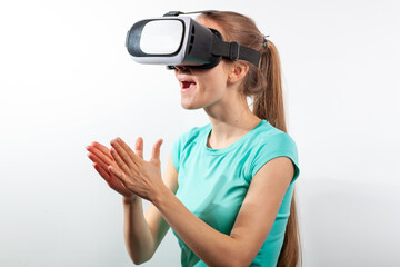 Girl in virtual reality glasses watching surprised shocking video. Young woman looking at futuristic social network map concept