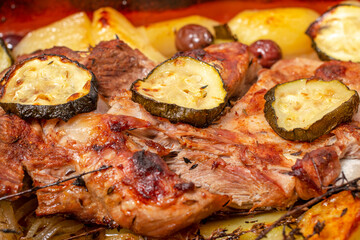 Roasted lamb with potato and zucchini