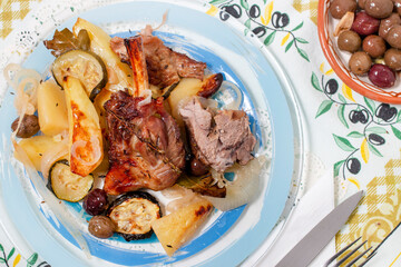 Roasted lamb with potato and zucchini