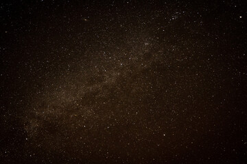 Milky Way with Cassiopeia and Andromeda in dark starry sky in winter in Texas