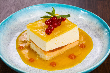 Traditional Cheesecake with orange sauce