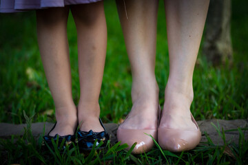 Sao Paulo, SP, Brazil - February 15 2020: photograph of daughter and mother feet side by side