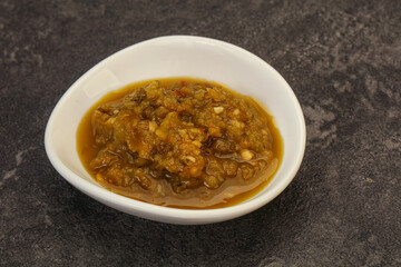 Green spicy sauce in the bowl