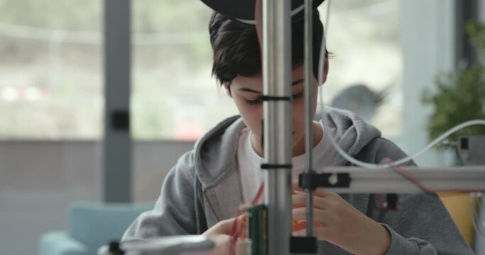 Student printing a 3D prototype