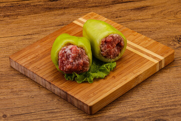Raw stuffed bell pepper with meat