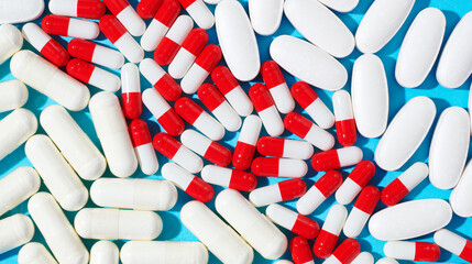 Capsules and Pills  on Blue Background