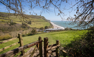 Looking down on Branscombe beach from a style on the South West Coast Path in Branscombe, Devon, UK
