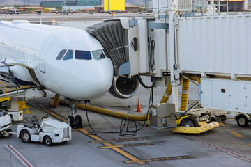 jet engine against a plane at the airport on loading
