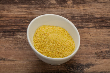 Raw cous cous heap in the bowl