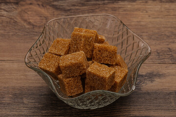 Cane sugar cubs in the bowl